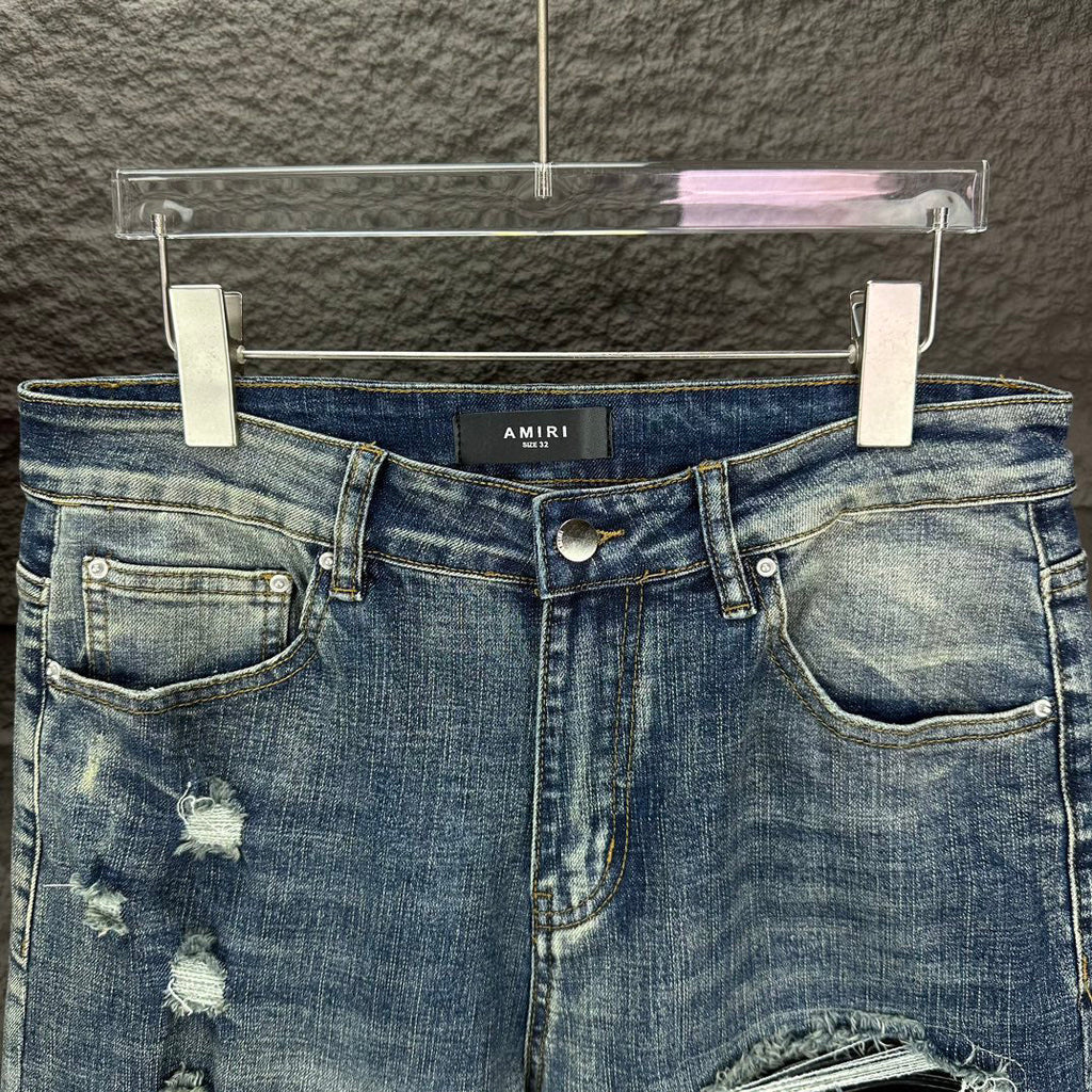 AMIRI Ripped Ribbed Patch Slim‑Fit Denim Jeans